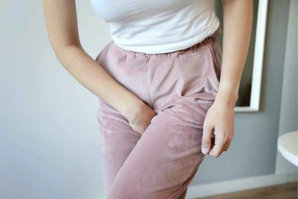 woman running for the toilet because of urinary incontinence Chandler's Ford